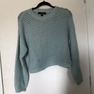 Knitted blue sweater